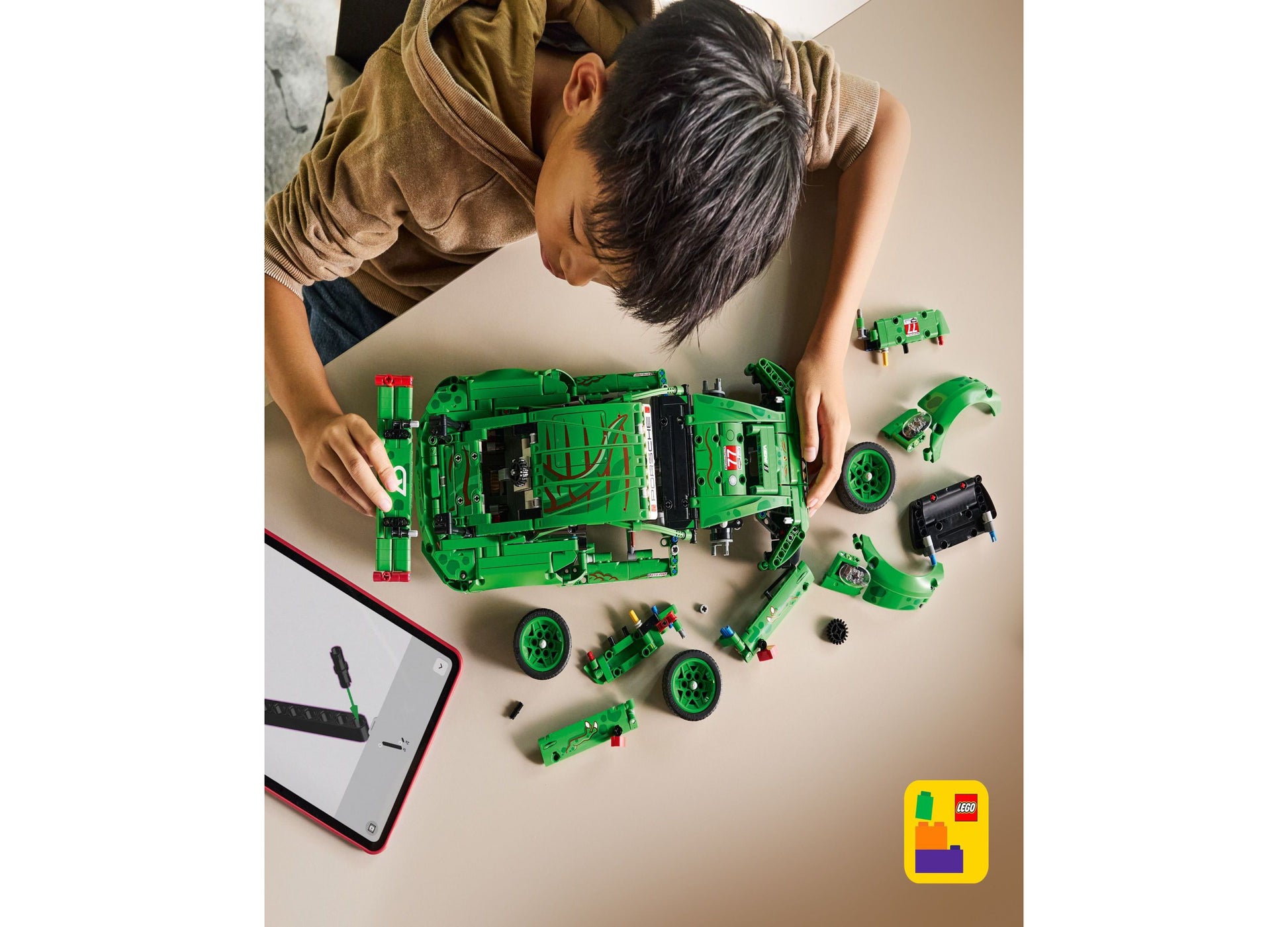 LEGO Technic Porsche 911 GT3 R green racing car set disassembled showing components