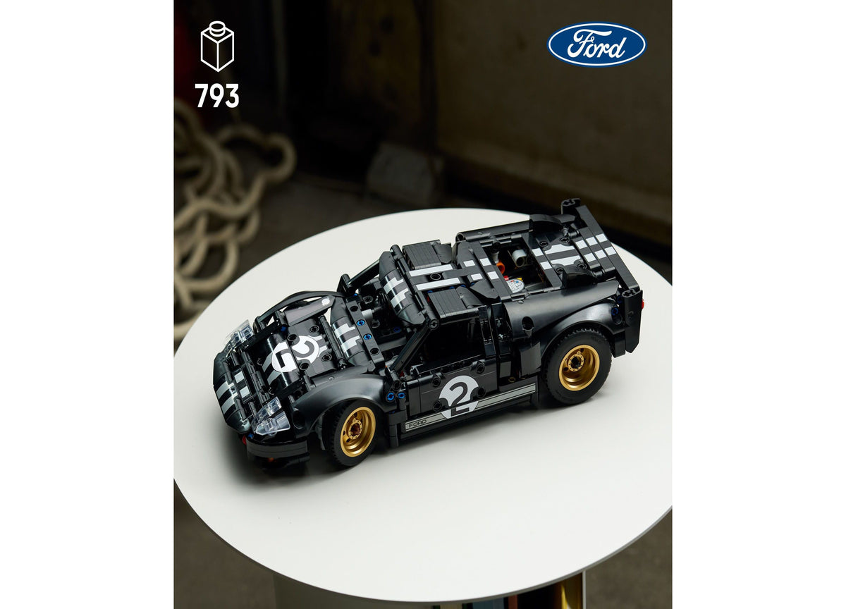 LEGO Technic 1966 Ford GT40 MKII Race Car Building Set with 793 pieces, displayed as assembled black model with white...