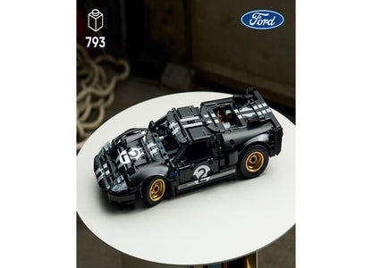 LEGO Technic 1966 Ford GT40 MKII Race Car Building Set with 793 pieces, displayed as assembled black model with white...