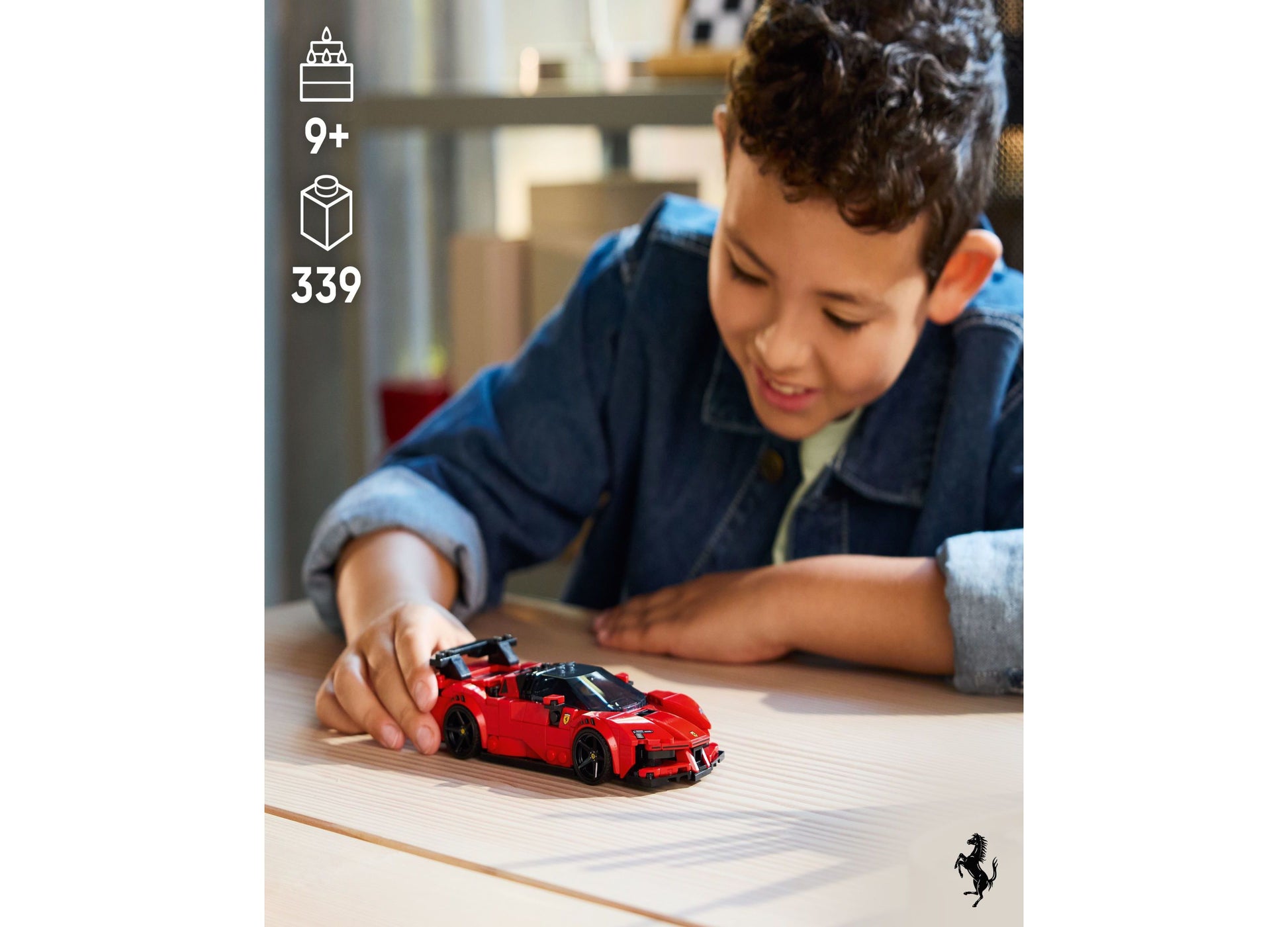 Child playing with red LEGO Speed Champions Ferrari SF90 sports car building toy set
