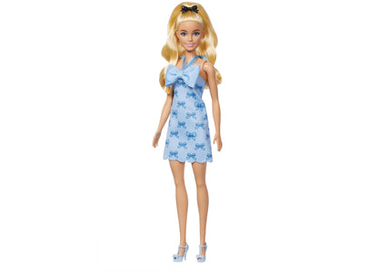 Barbie Fashionistas Doll wearing light blue halter dress with bow print and black bow headband