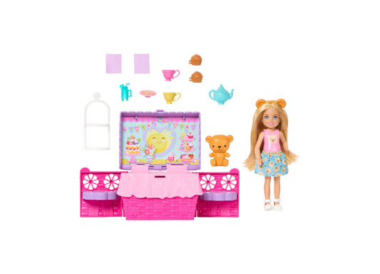 Barbie Club Chelsea tea party playset with pink pop-up furniture, small doll with blonde hair wearing pink top and blue skirt, tan teddy bear, and accessories i