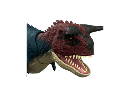 Jurassic World Charge N Chomp Carnotaurus dinosaur action figure with red and dark blue coloring, open mouth with teeth