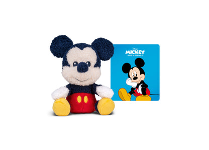 Tonies Cuddle Tonies Mickey Mouse plush with blue ears, cream face, red shorts, and yellow feet, displayed next to bl...