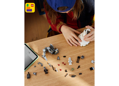 LEGO Star Wars AT-RT Attack 75444 building set with 297 pieces displayed on wooden table
