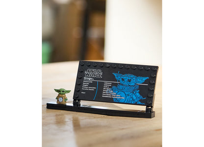 LEGO Star Wars Grogu Building Set with minifigure displayed on wooden table