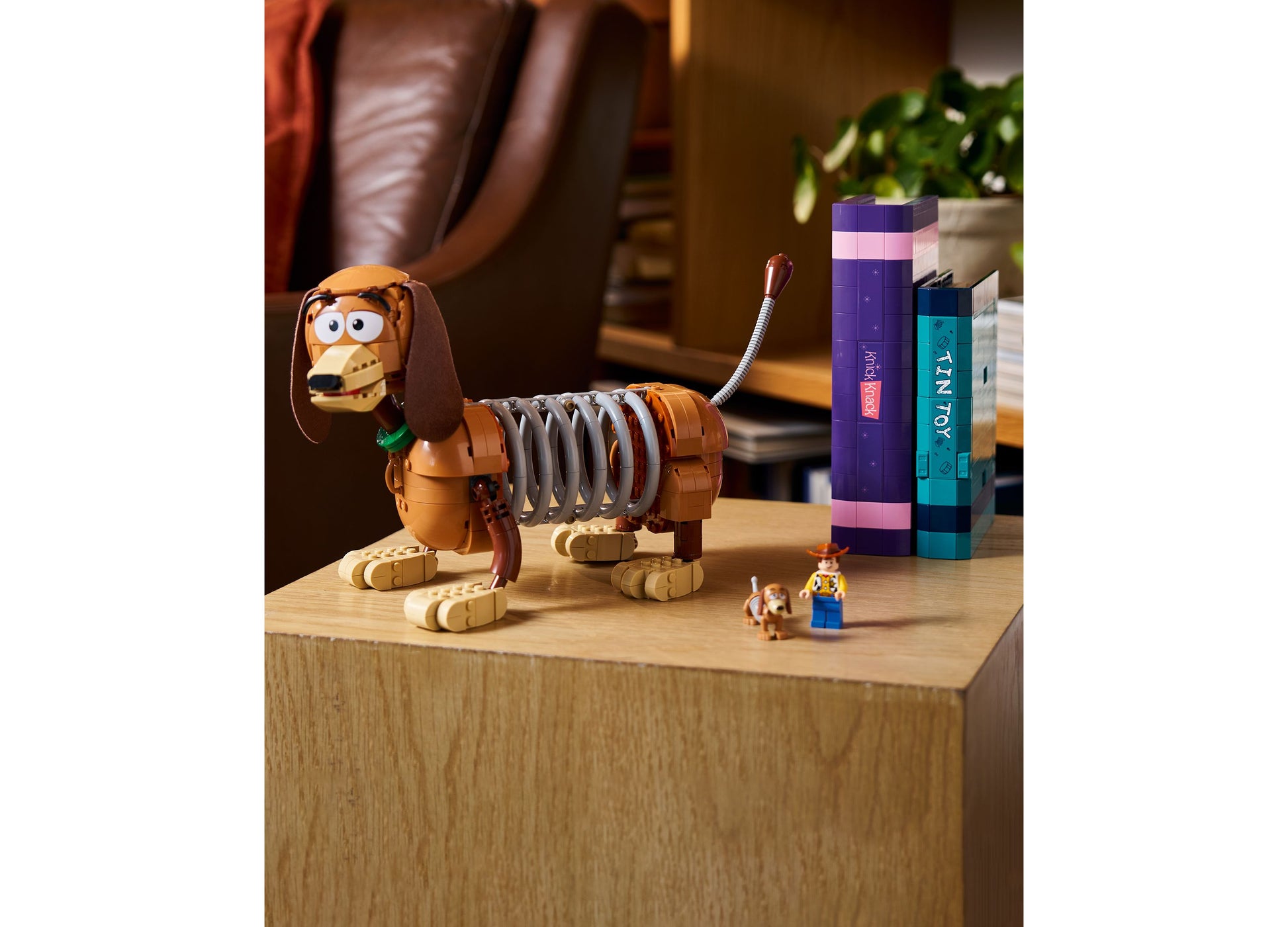 LEGO Disney Pixar Toy Story Slinky Dog Bookends set with brown dog figure and colorful book spines