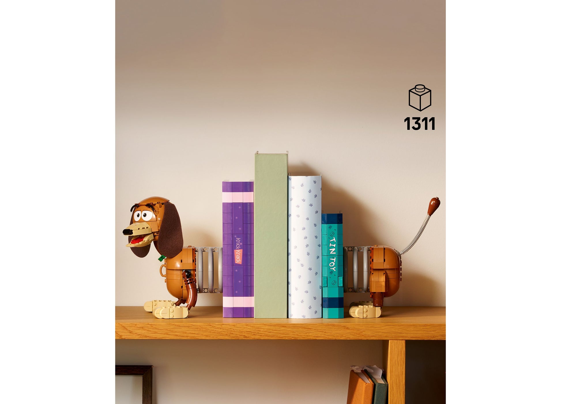 LEGO Disney Pixar Toy Story Slinky Dog Bookends set with colorful books, 1311 pieces