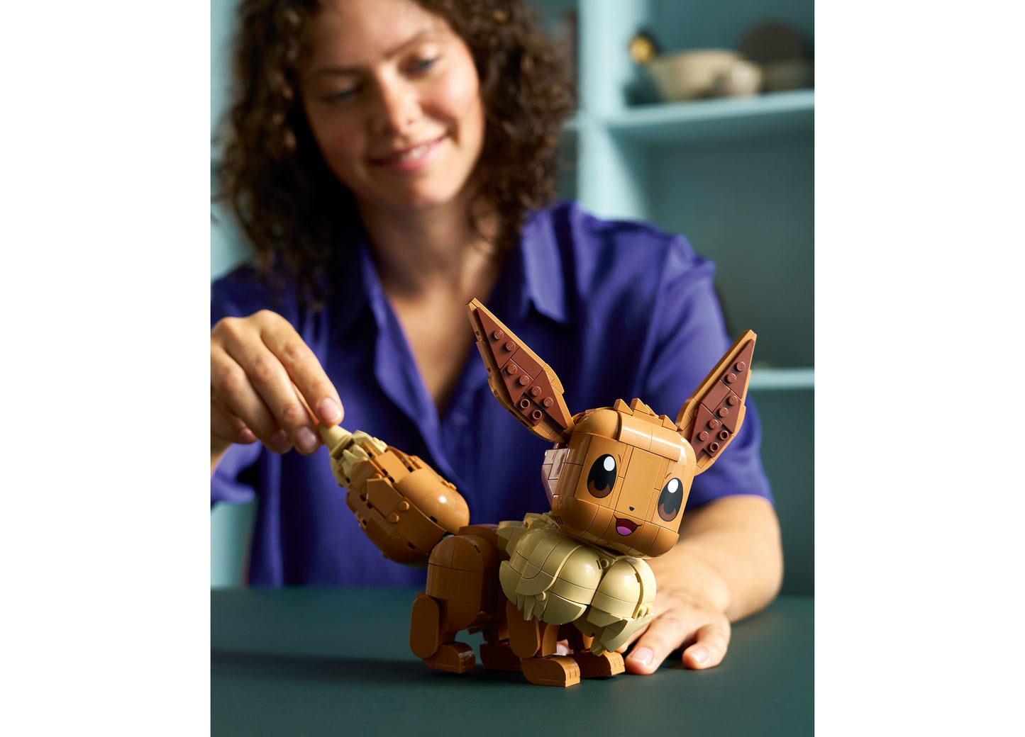 LEGO Pokémon Eevee Building Set 72151 in brown and tan, displayed with movable ears and limbs