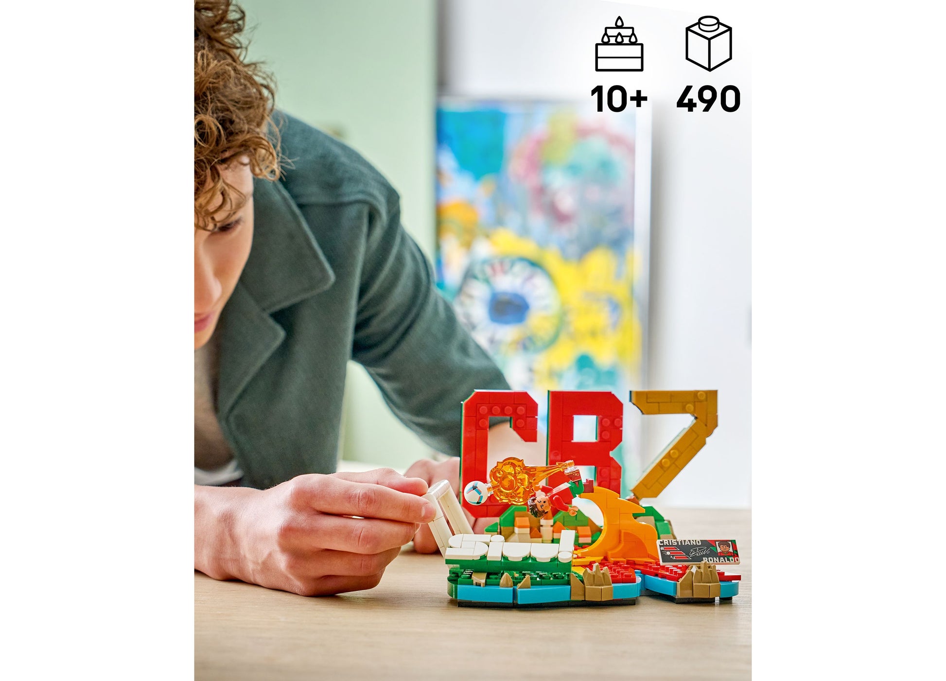 LEGO Cristiano Ronaldo Soccer Highlights 43012 set with 490 pieces being assembled by child