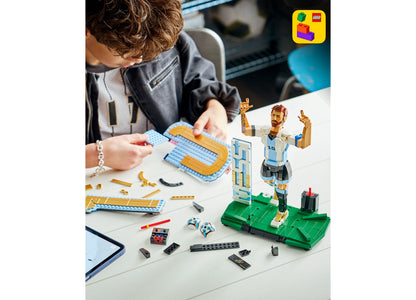 LEGO Lionel Messi Soccer Legend set with minifigure, green soccer field base, and blue building pieces
