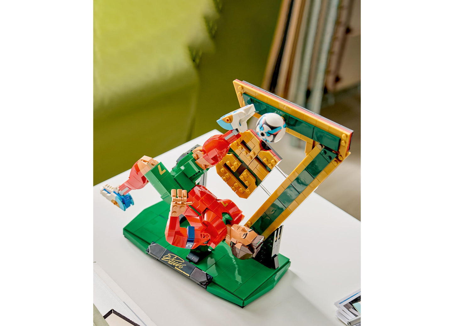 LEGO Cristiano Ronaldo Soccer Legend 43016 set with green base, red soccer player figure, and gold trophy display