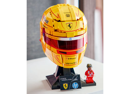 LEGO Scuderia Ferrari HP Lewis Hamilton Helmet 43022 with yellow and red design displayed on stand