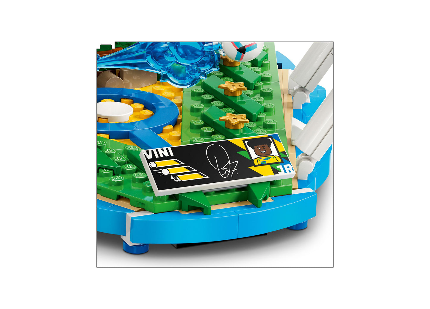 LEGO Vini Jr. Soccer Highlights 43027 set with green baseplate, blue curved base, and minifigure