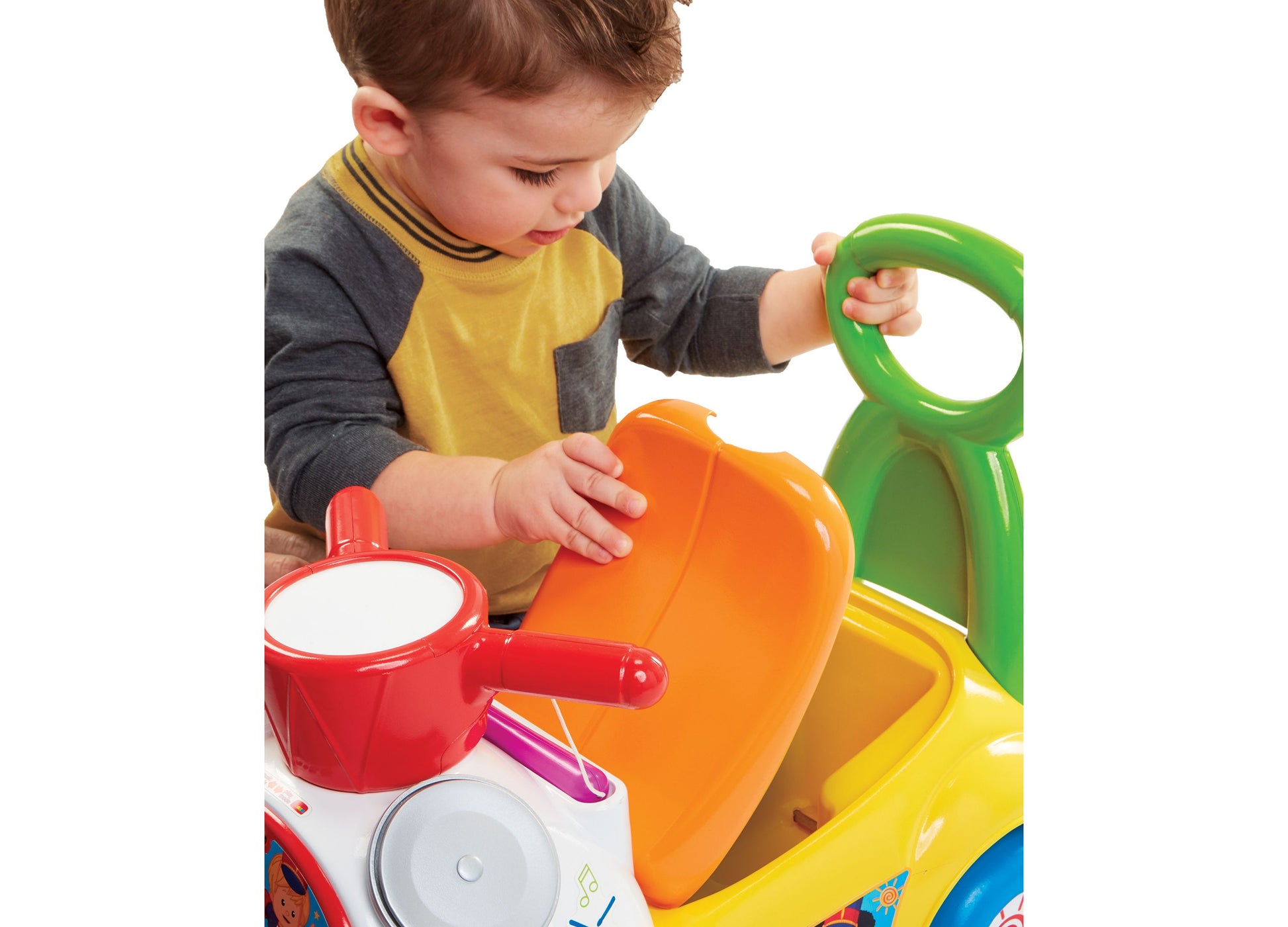 Fisher Price Little People Ride On Toy in bright colors with toddler playing