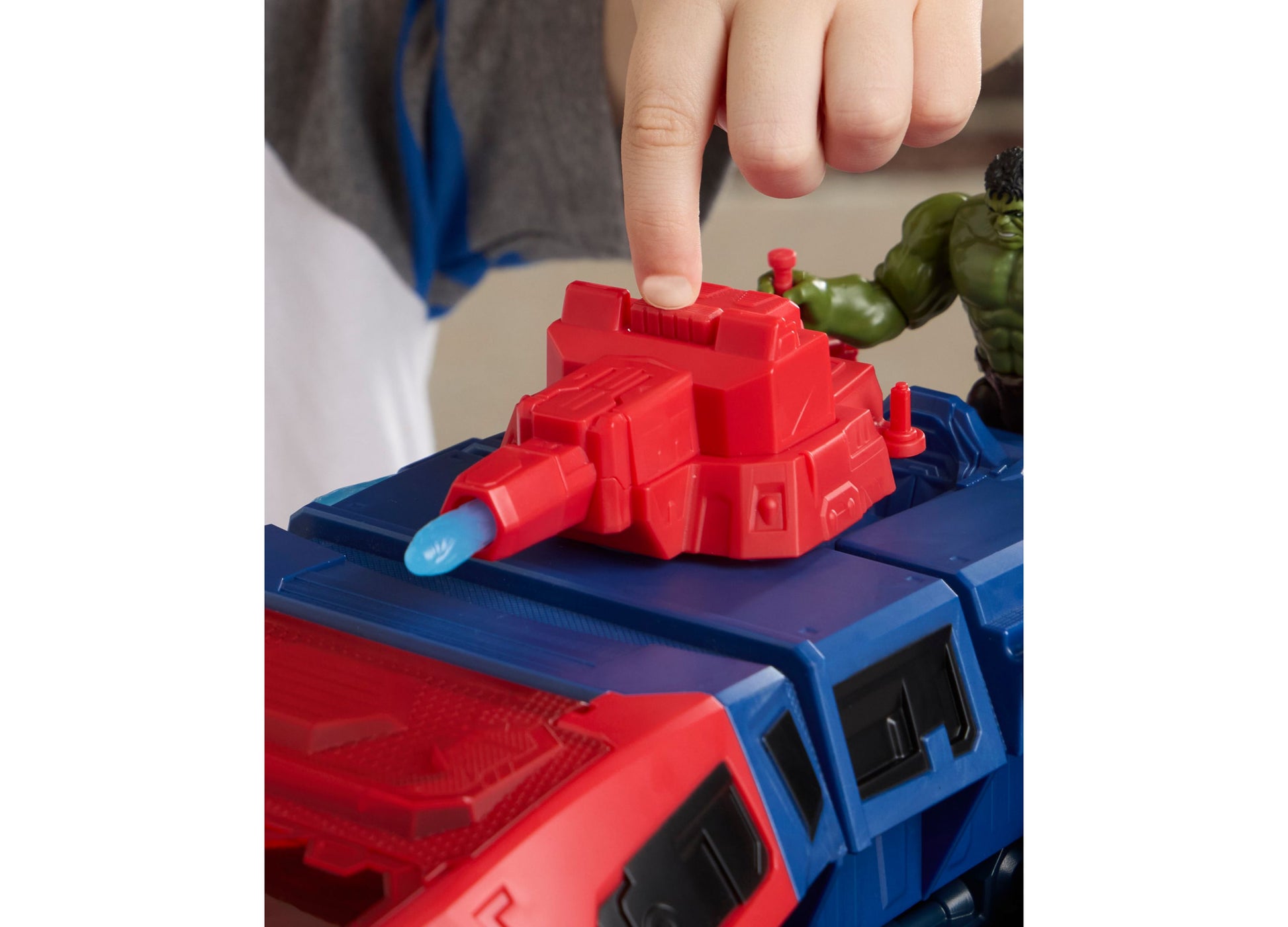 Spider-Man 2-In-1 Super Chompin Tank red and blue toy with child's hand