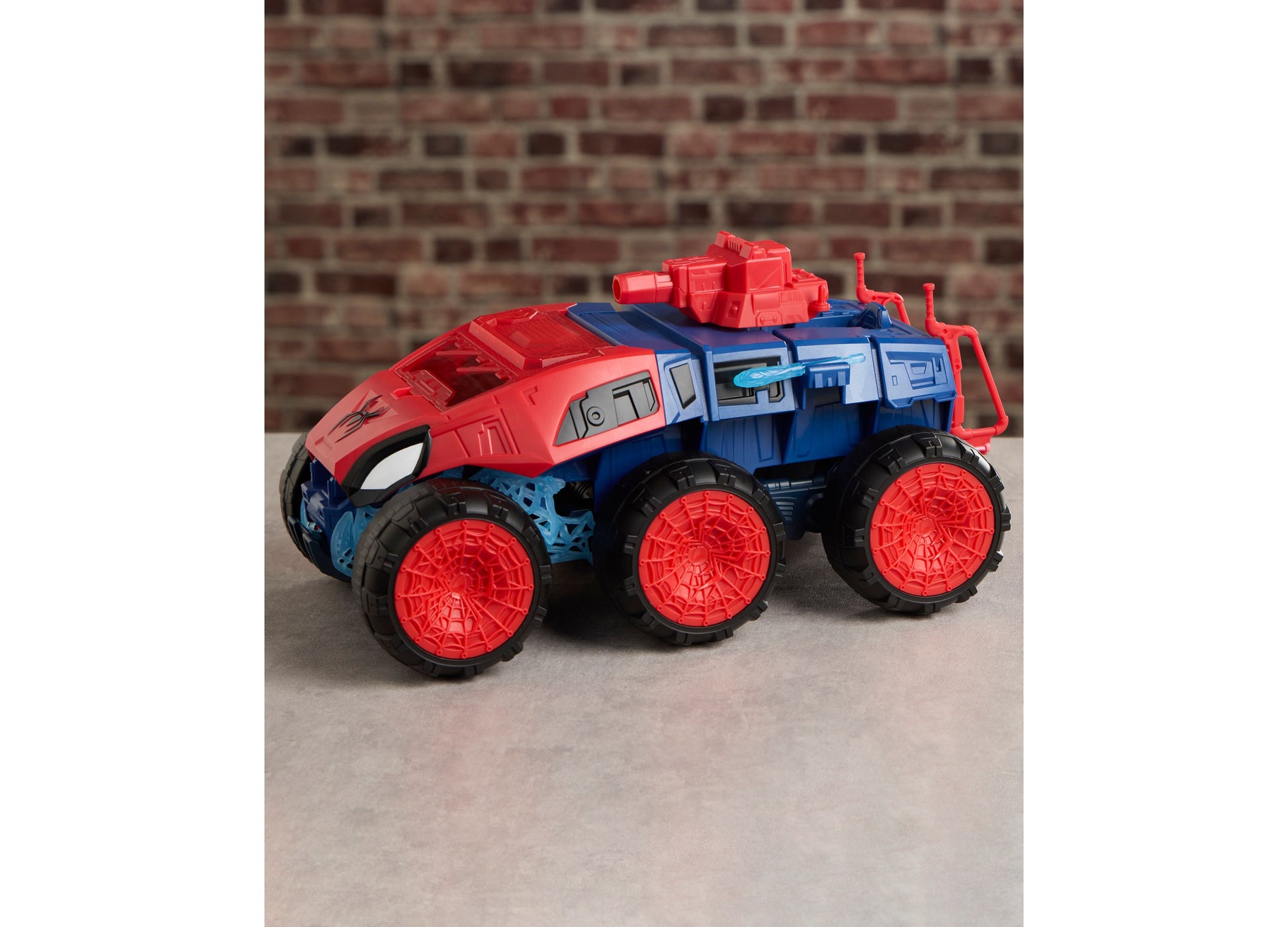 Spider-Man 2-In-1 Super Chompin Tank toy with red and blue colors and large red wheels