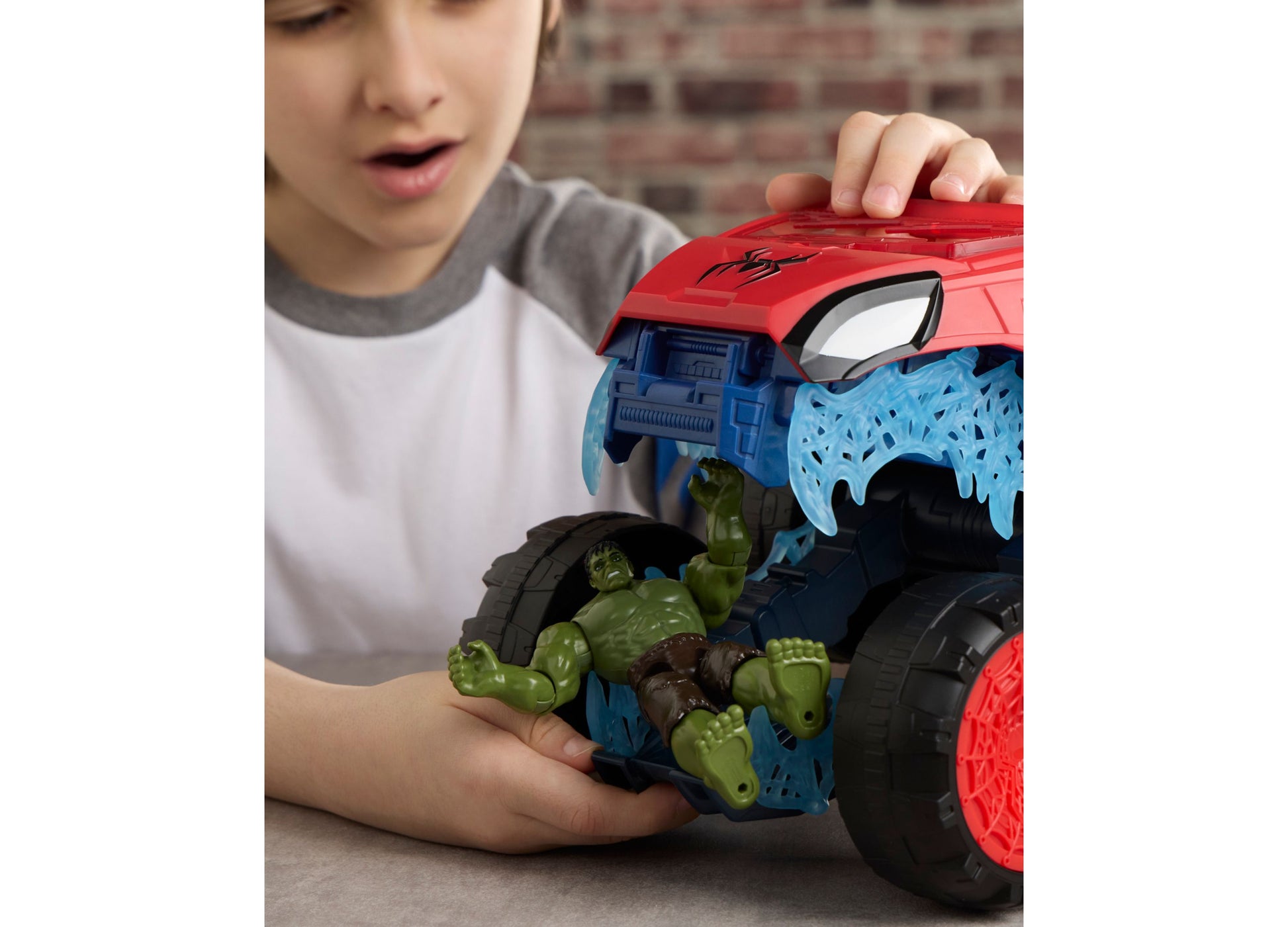 Spider-Man 2-In-1 Super Chompin Tank red blue toy with child playing