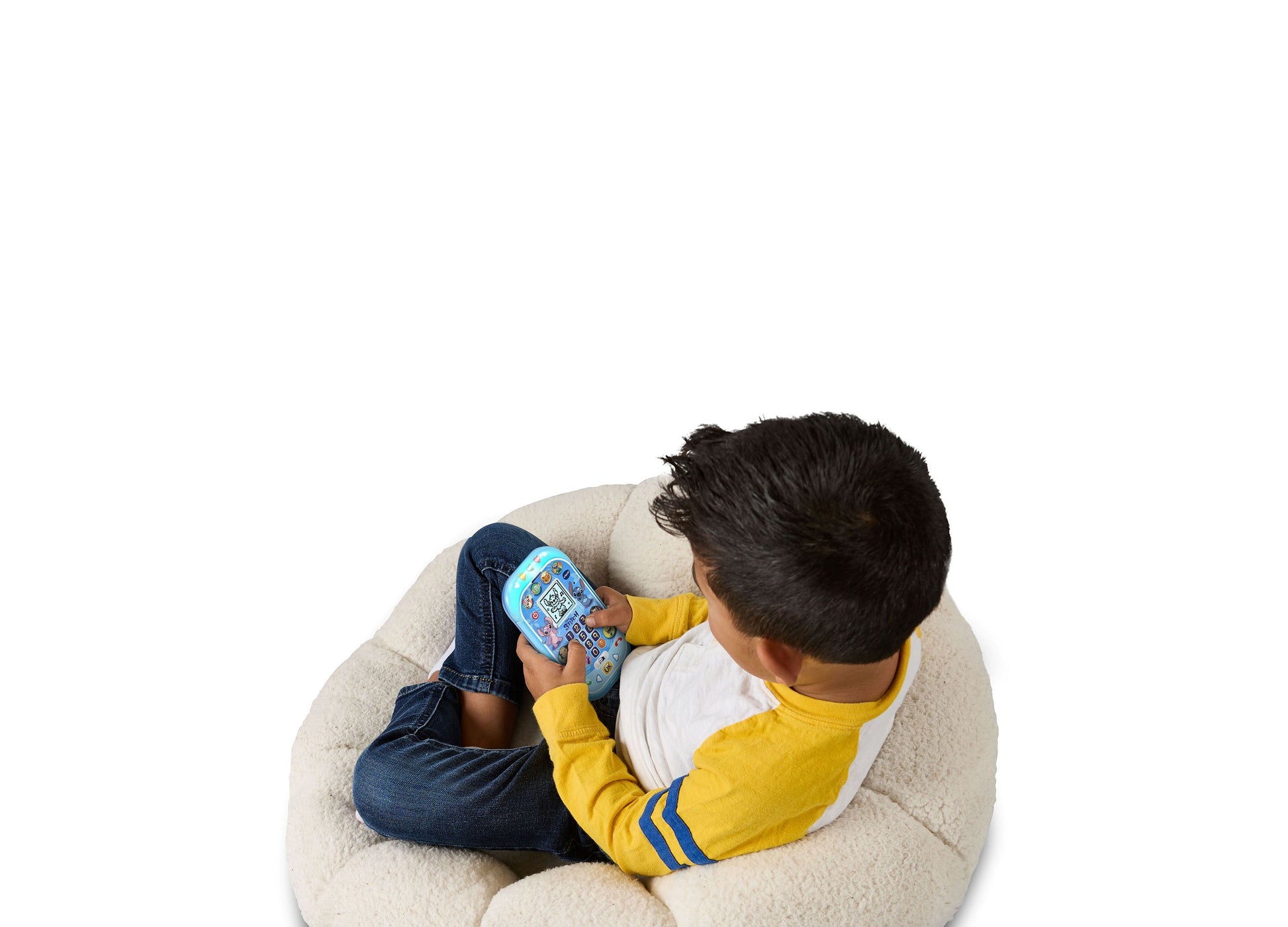 VTech Stitch Learning Phone in blue with child playing on beige chair