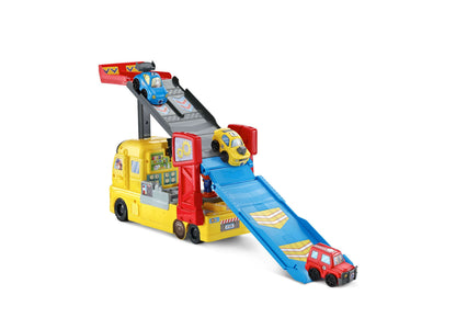 VTech 3-in-1 Race & Repair Hauler yellow interactive playset with blue ramp and toy cars
