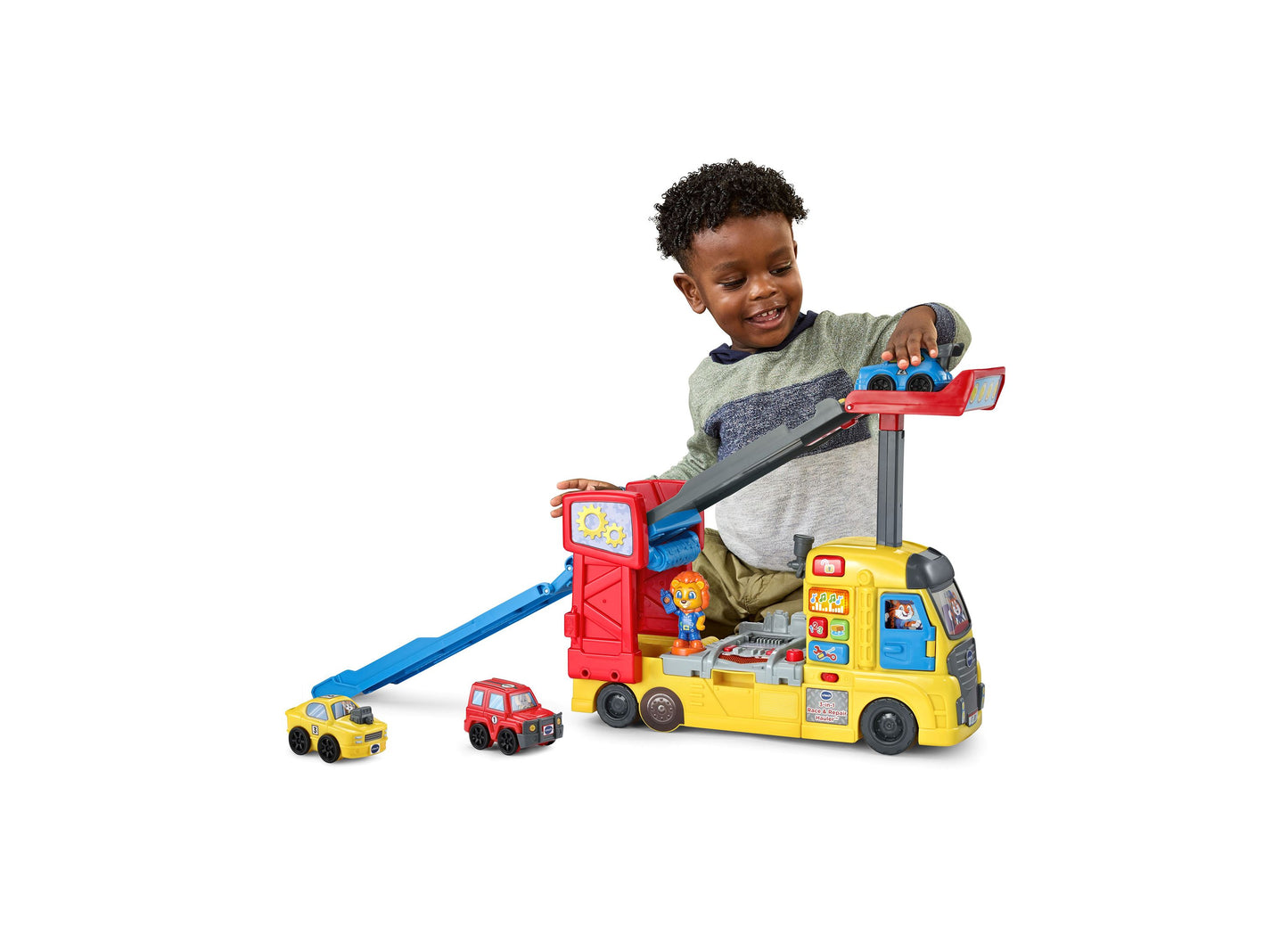 VTech 3-in-1 Race & Repair Hauler yellow and red interactive toy vehicle with toddler playing