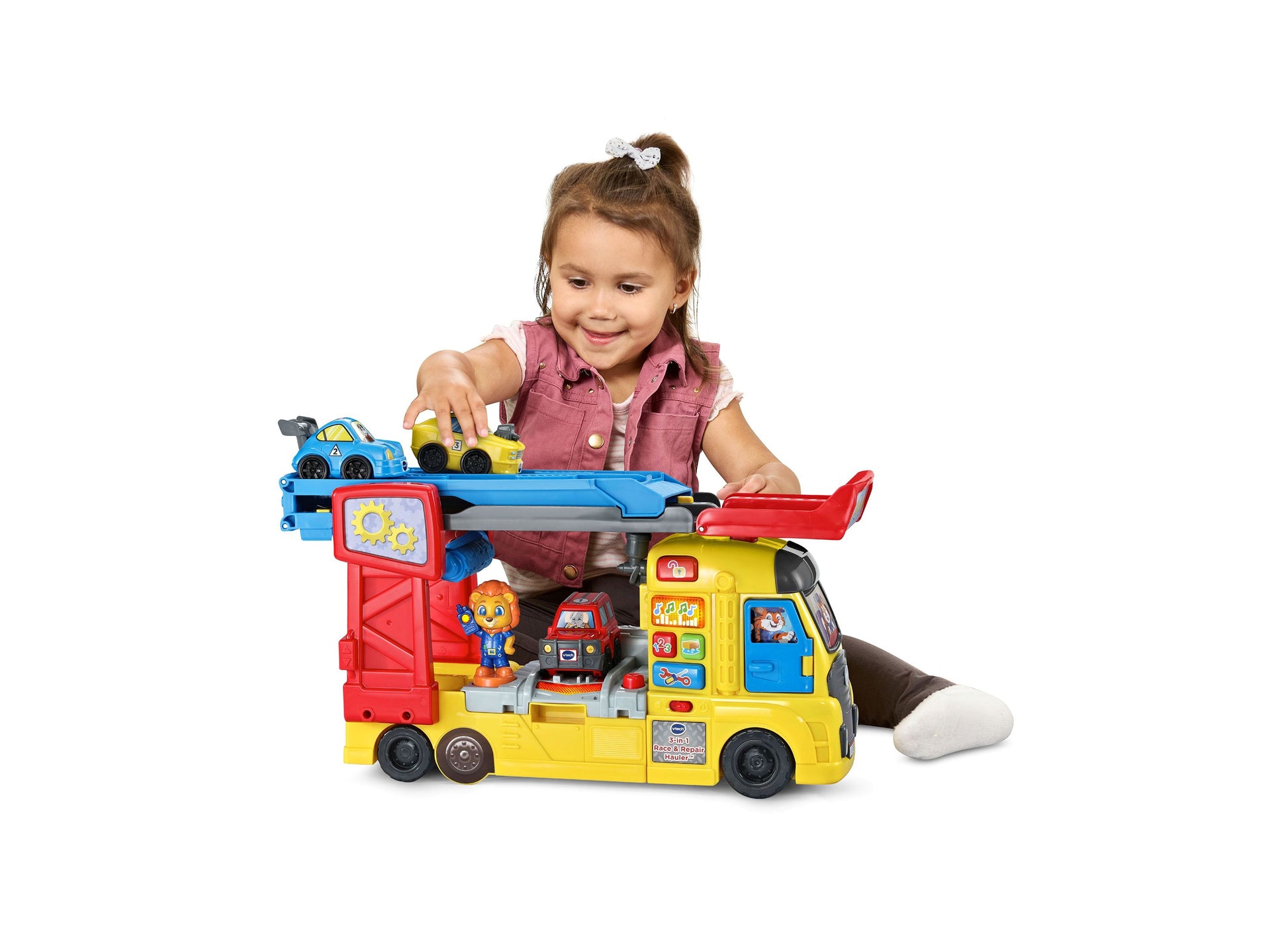 VTech 3-in-1 Race & Repair Hauler yellow and red interactive toy vehicle with toddler playing