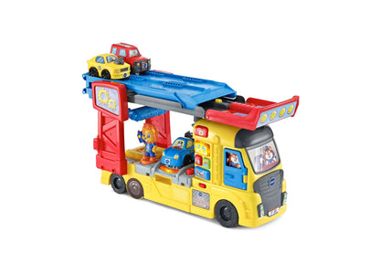 VTech 3-in-1 Race & Repair Hauler yellow interactive playset with red lift and blue ramp