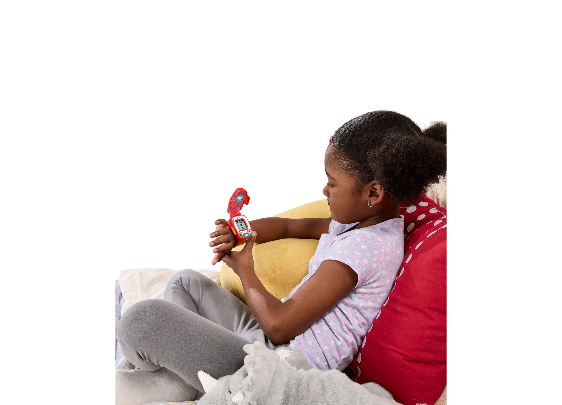 Child wearing VTech Iron Man Learning Watch with red band, displaying interactive screen