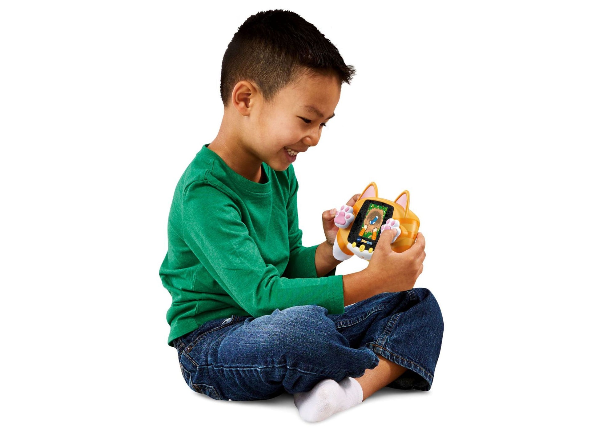 Boy playing with VTech Kitten Quest virtual pet toy with orange cat ears design
