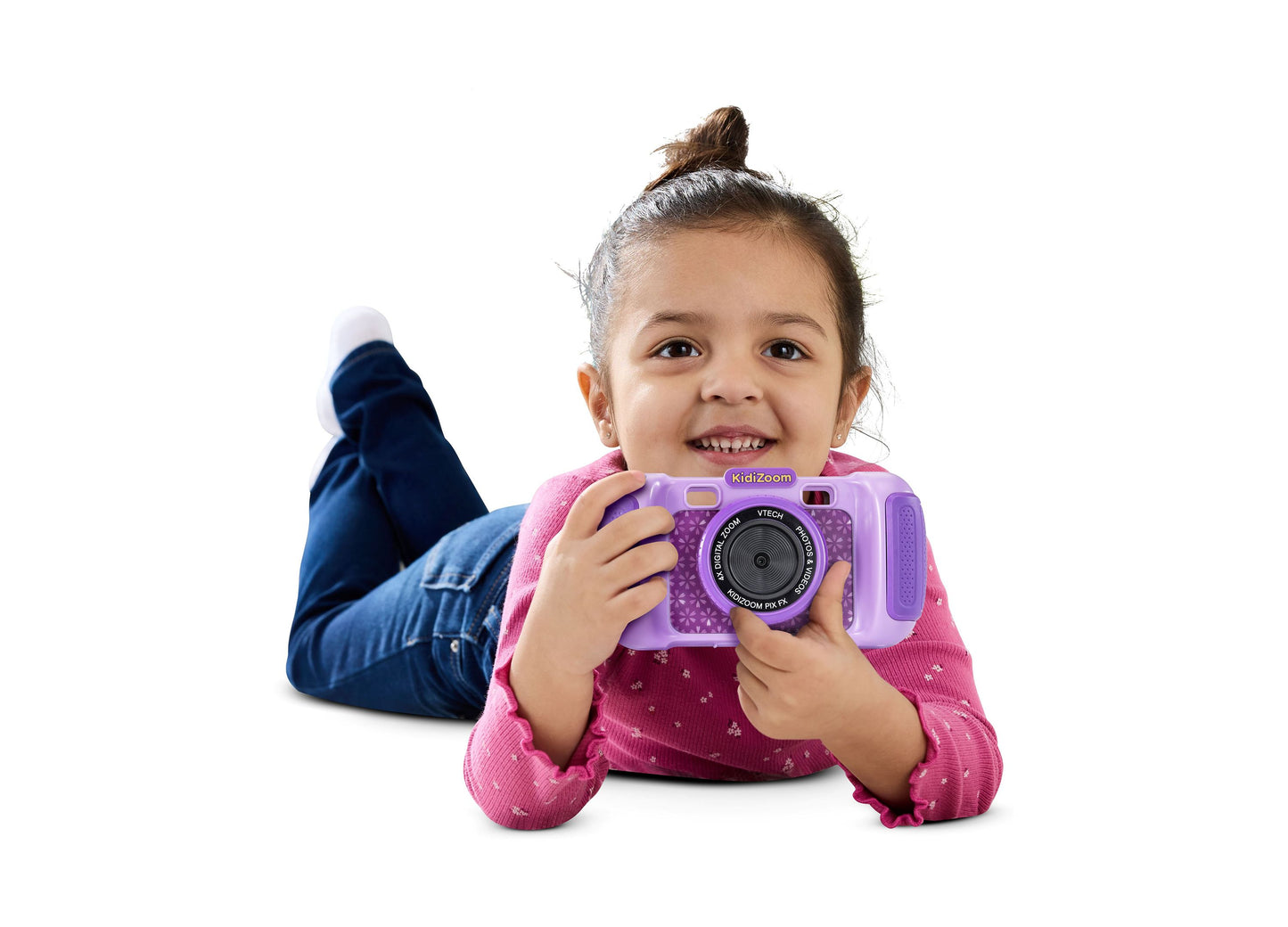 VTech KidiZoom purple digital camera with rotating lens held by smiling child