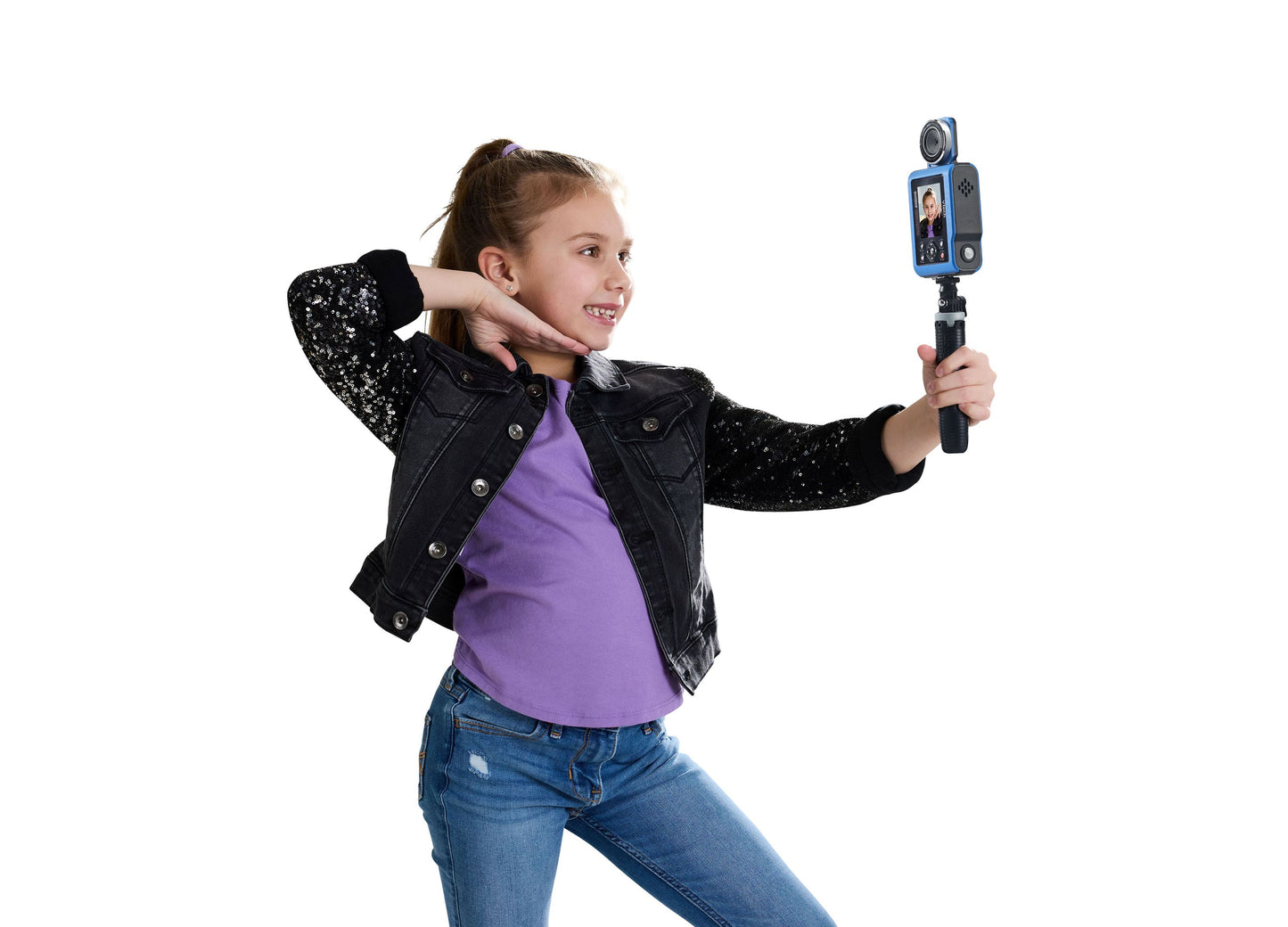 Girl using VTech KidiZoom Creator Cam Ultra digital camera with selfie stick and blue device