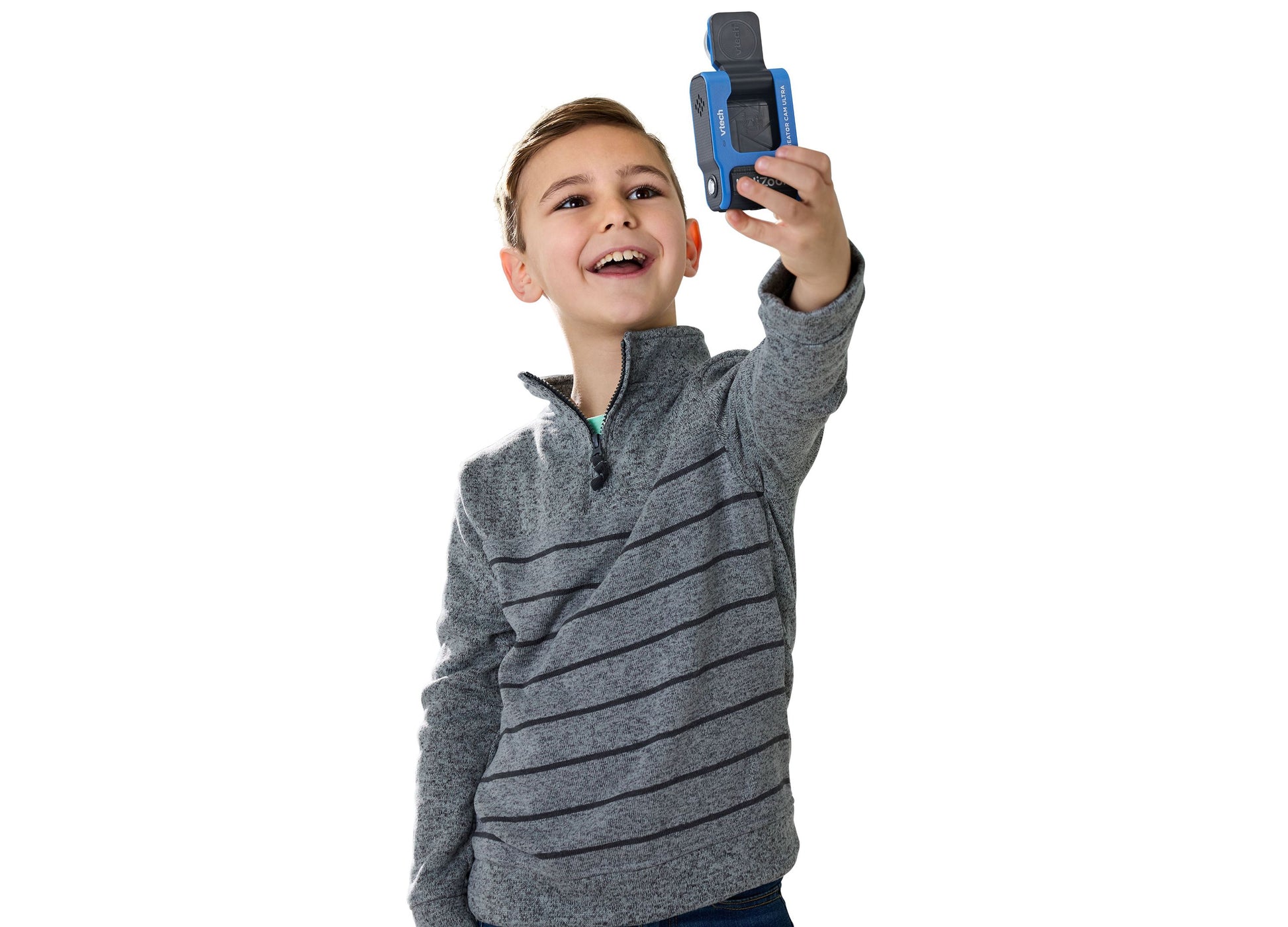 VTech KidiZoom Creator Cam Ultra blue digital camera held by smiling child