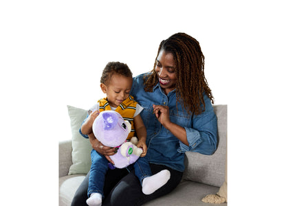 LeapFrog My Best Pal Violet purple plush toy with interactive features being played with by child and adult