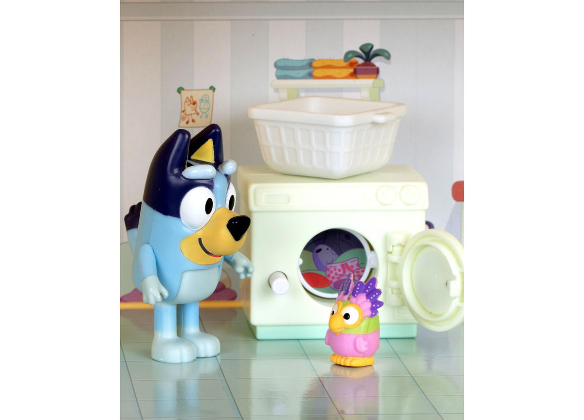 Bluey Lights & Sounds House Playset with blue dog character, washing machine, laundry basket, and colorful accessories