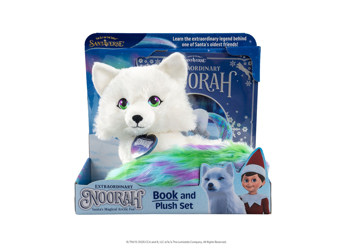 Elf on the Shelf Extraordinary Noorah Book and Plush Set featuring white arctic fox with colorful rainbow tail and he...