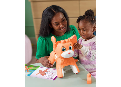 Orange Mega Bloks Fisher-Price Rolling Kitten 3-in-1 building set with adult and child playing together