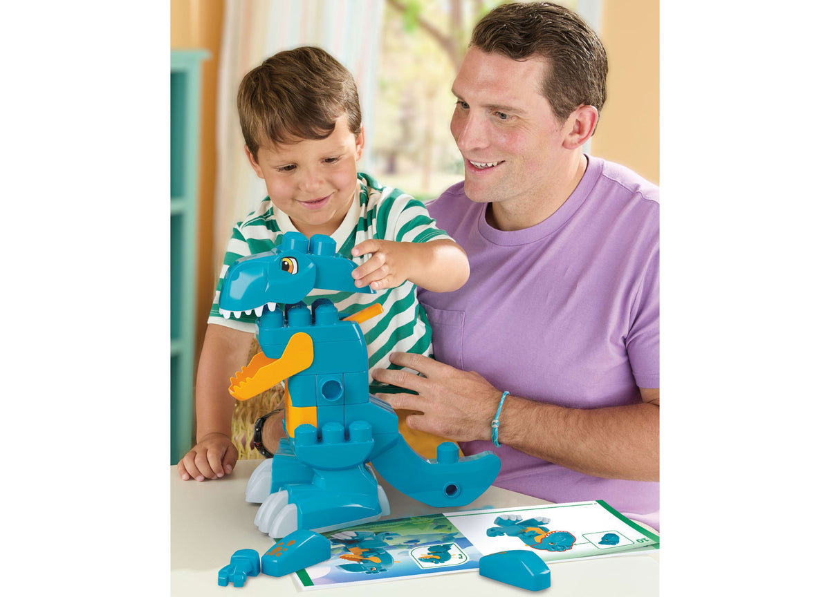 Mega Bloks Fisher-Price Build & Chomp Dinosaur blue T-Rex with rolling wheels, adult and child building together