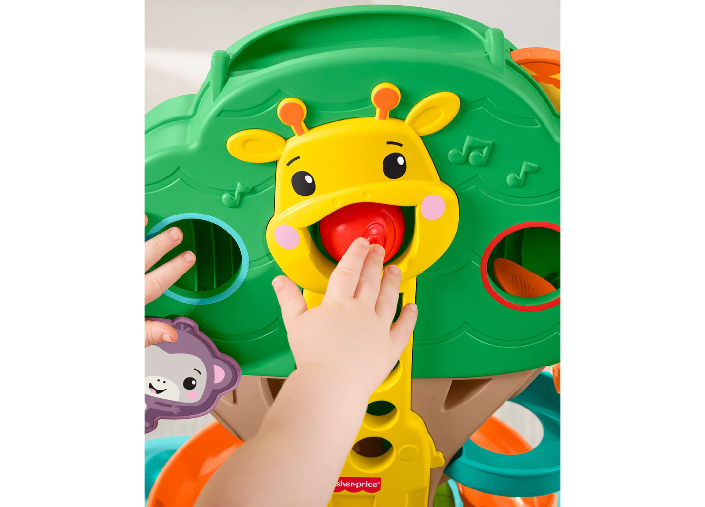 Fisher Price Jungle Tree Musical Activity Center with yellow giraffe and colorful ball drop features