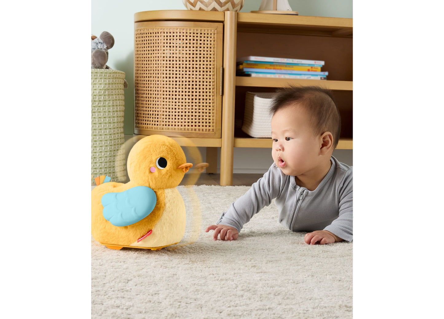 Fisher Price Cuddle and Crawl Duck yellow plush toy with baby on tummy time