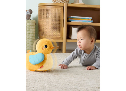 Fisher Price Cuddle and Crawl Duck yellow plush toy with baby on tummy time