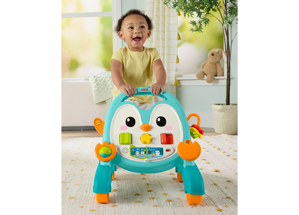 Fisher-Price 2-in-1 Musical Penguin Activity Walker in turquoise and orange with toddler playing