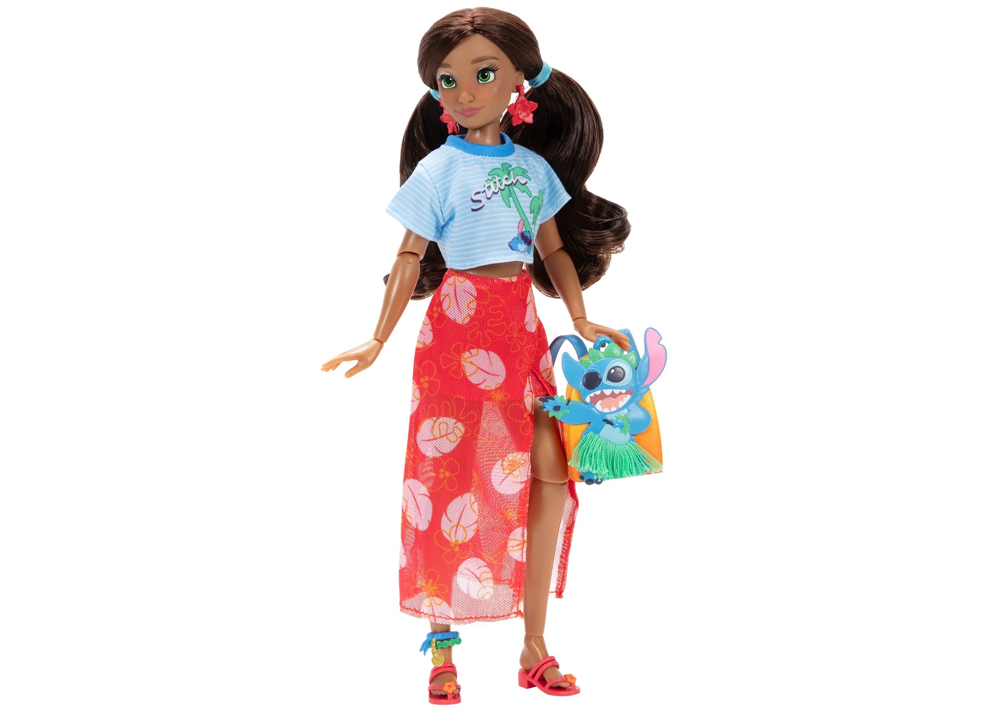 Disney ILY 4ever Lilo & Stitch doll with brown hair, blue top, red leaf skirt, and Stitch plush accessory