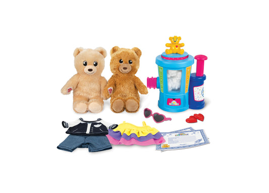 Build-A-Bear Workshop Stuffing Station playset with two tan bears, blue and pink station, heart accessory, and clothing