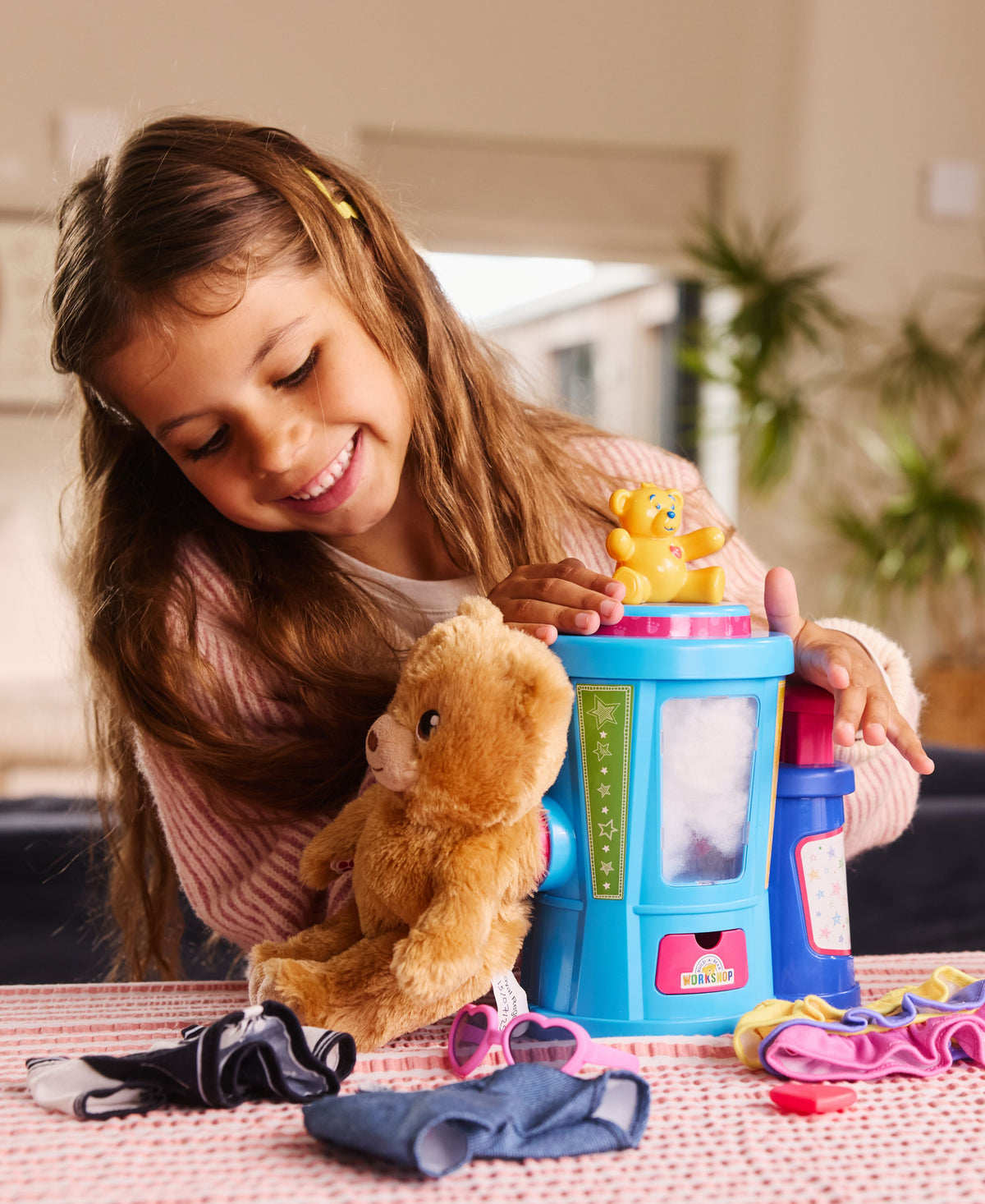 Casdon Build-A-Bear Workshop Stuffing Station playset with blue tower, mini bears, and colorful accessories
