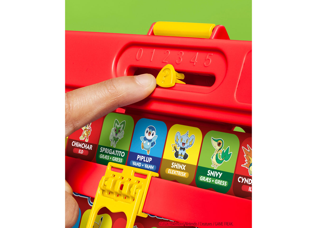 Pokémon Edition Guess Who board game with red fold-up case, yellow slider, and character cards including Chimchar, Sp...