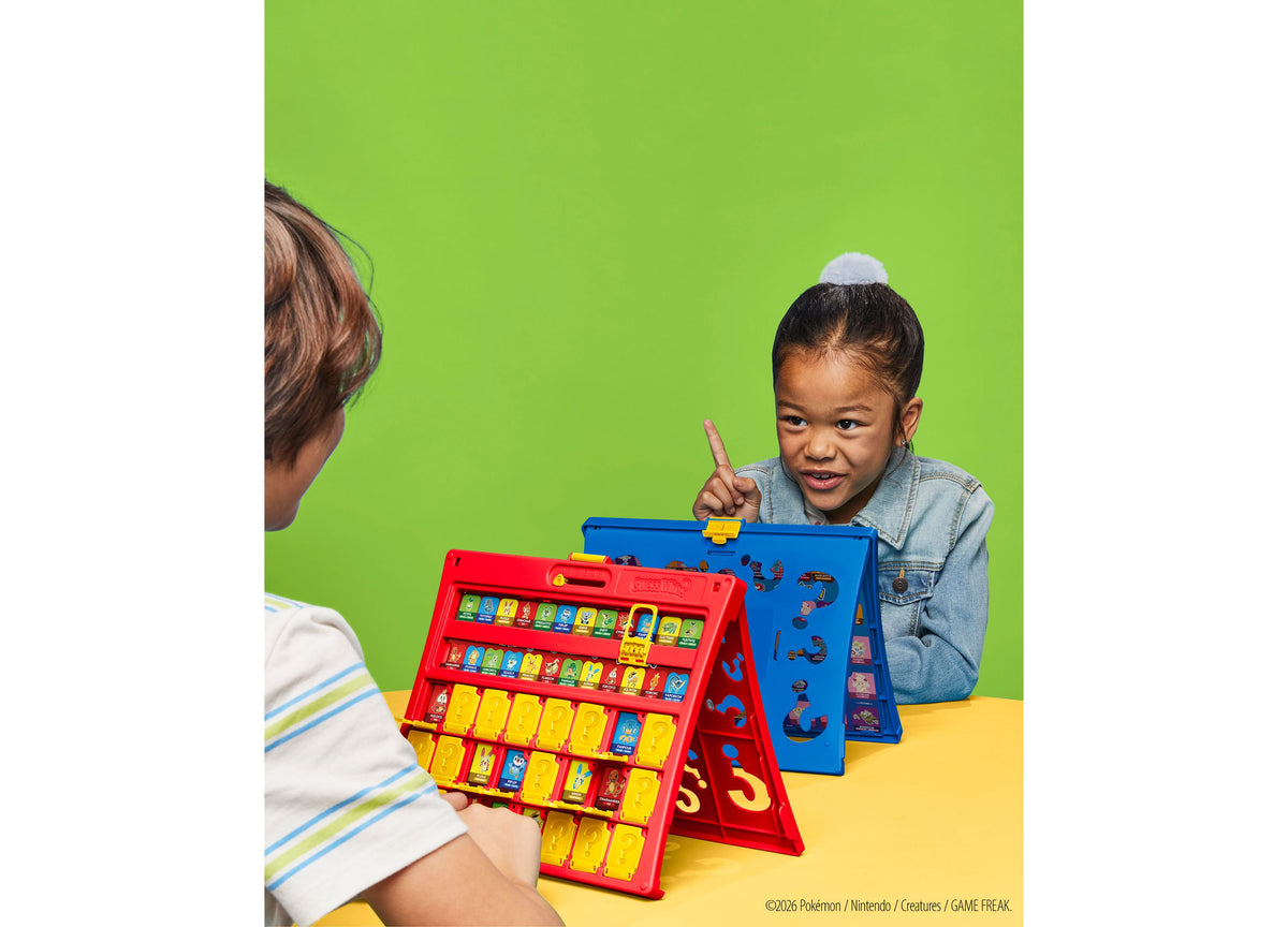 Hasbro Gaming Guess Who Pokémon Edition board game with red and blue fold-up cases displayed on yellow surface
