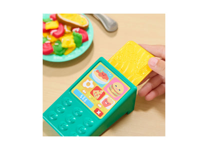 Play-Doh Super Sizzlin Kitchen Playset with turquoise base, yellow pasta maker attachment, and colorful food-themed s...
