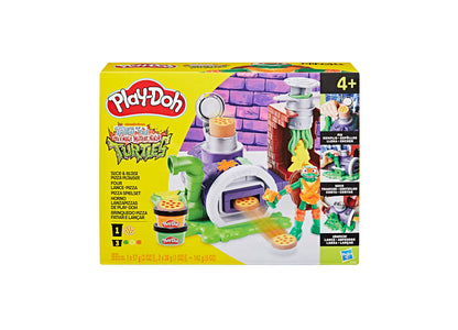 Play-Doh TMNT Slice and Blast Pizza Playset with purple oven, green launcher, and NINJA TURTLES figures