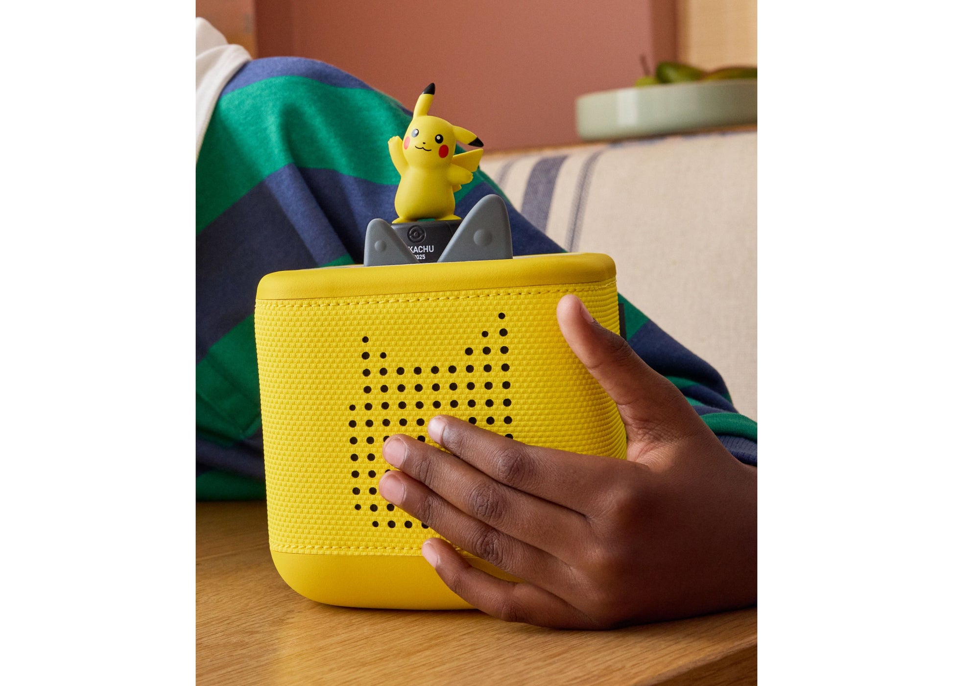 Tonies Toniebox 2 Pikachu yellow starter set with Pikachu figurine, held in hands