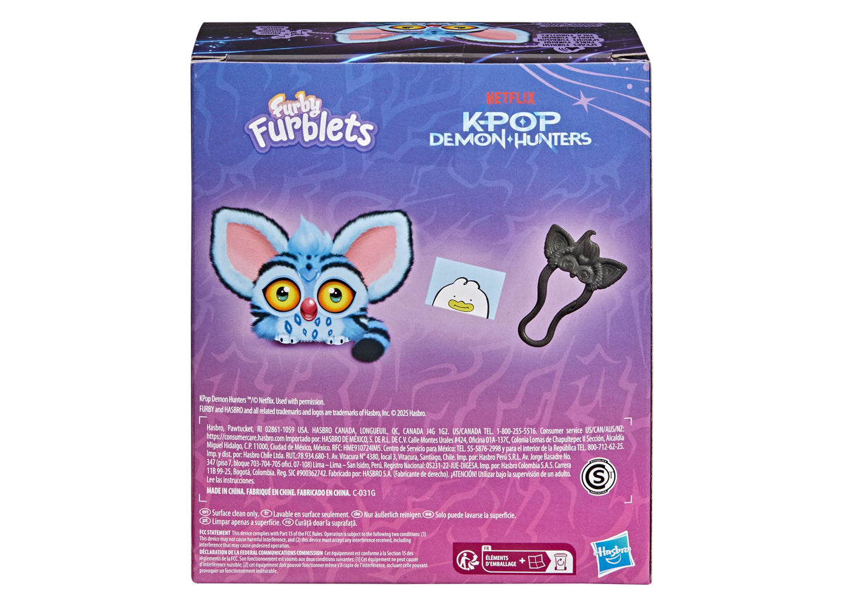 Furby KPop Demon Hunters blue interactive plush with yellow eyes, includes removable clip